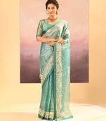 Sea green embroidered tissue saree set
