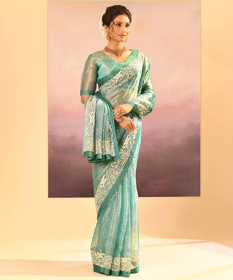 Sea green embroidered tissue saree set