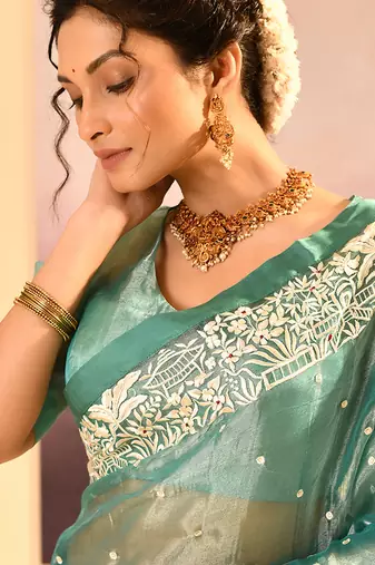 Sea green embroidered tissue saree set