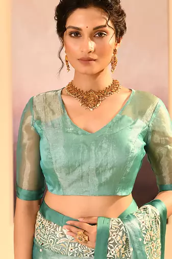 Sea green embroidered tissue saree set