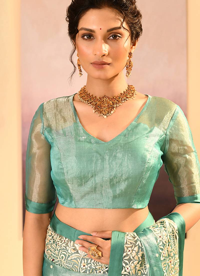 Sea green embroidered tissue saree set