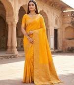 Yellow  soft banarasi silk saree with zari weaving  design with running blouse