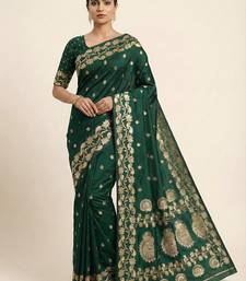 Green soft banarasi silk saree with zari weaving  design with running blouse