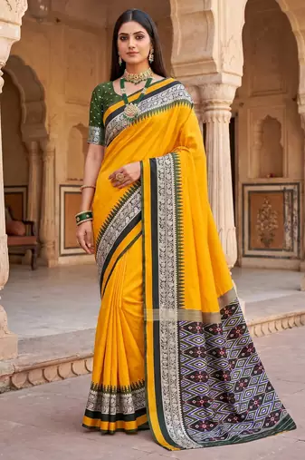 Yellow soft and smooth silk blend saree in patola style with detailed zari work