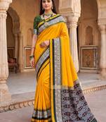 Yellow soft and smooth silk blend saree in patola style with detailed zari work