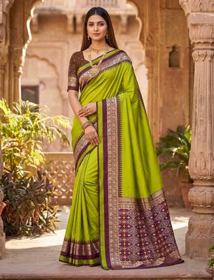 Parrot green soft and smooth silk blend saree in patola style with detailed zari work 1