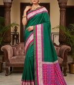 Green soft and smooth silk blend saree in patola style with detailed zari work