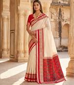 White soft and smooth silk blend saree in patola style with detailed zari work