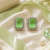 Rose gold finish parrot green luxe earrings