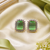 Rose gold finish parrot green luxe earrings