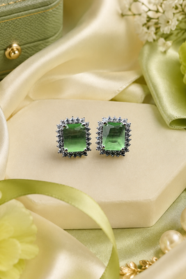 Rhodium finish forest charm studs 2