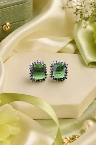 Rhodium finish forest charm studs