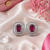 Rhodium finish royal ruby octagon studs