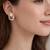 Gold tone floral wreath drop earrings with multicolor crystals, pearl accents polished finish, medium size