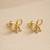 Gold bow stud earrings, twisted rope design, feminine style, post back closure