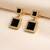 Double square drop earrings, black stone with crystal halo, gold tone, dangle style