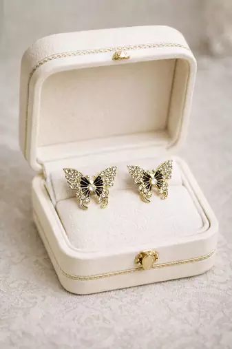 Butterfly stud earrings, gold tone with rhinestones, black enamel wings