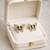Butterfly stud earrings, gold tone with rhinestones, black enamel wings