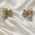 Butterfly stud earrings with pearls and crystals, elegant statement jewelry