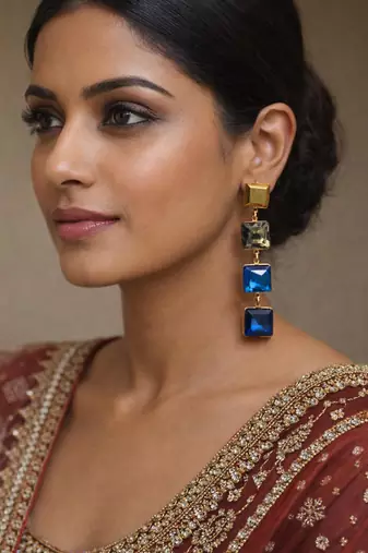 Gold tone square crystal drop earrings, blue and grey stones, dangle style, 4-tier design