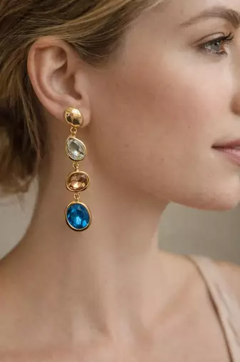 Gold tone drop earrings with multi-color crystal stones, dangle style, blue peach clear gems
