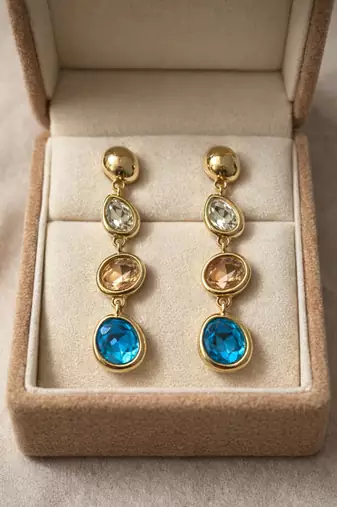 Gold tone drop earrings with multi-color crystal stones, dangle style, blue peach clear gems