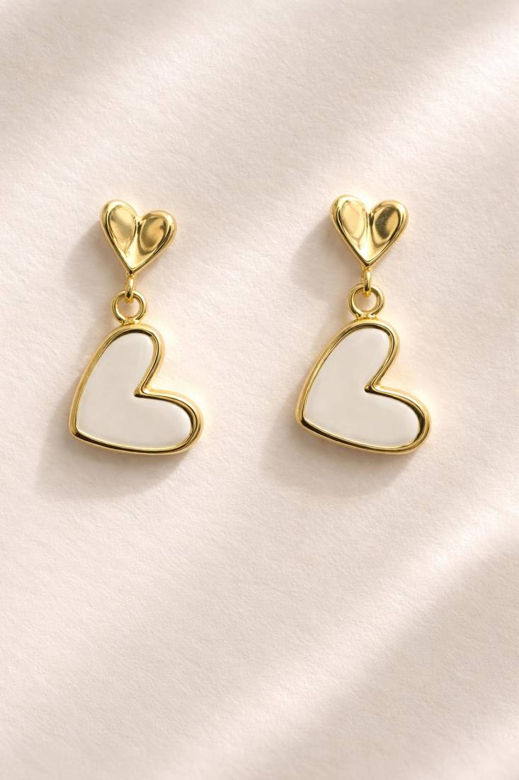 Gold-tone double heart drop earrings, white enamel pendant, stud back, dangle style
