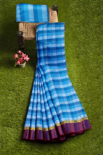 Sky blue checked cotton blend saree with purple border