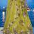 Women's Yellow Tissue Woolen Embroidered Lehenga Choli with Dupatta