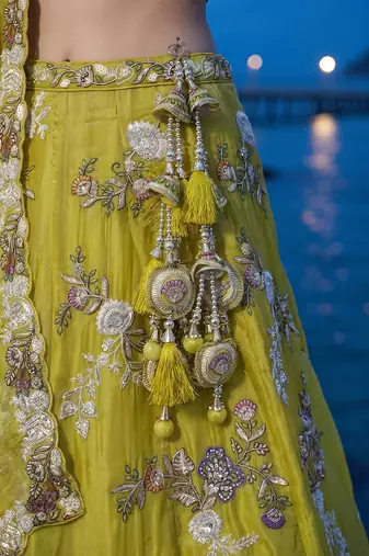 Women's Yellow Tissue Woolen Embroidered Lehenga Choli with Dupatta