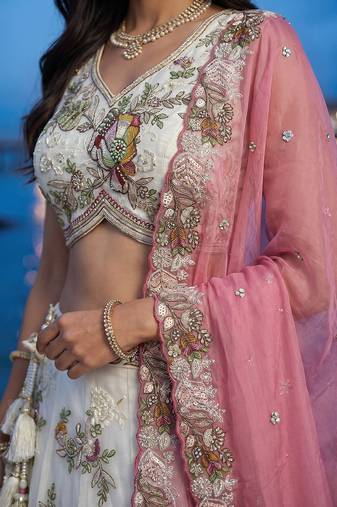 Women's Cream Tissue Woolen Embroidered Lehenga Choli with Dupatta