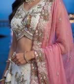 Women's Cream Tissue Woolen Embroidered Lehenga Choli with Dupatta