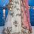 Women's Cream Tissue Woolen Embroidered Lehenga Choli with Dupatta