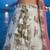 Women's Cream Tissue Woolen Embroidered Lehenga Choli with Dupatta