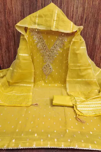 yellow  weaved shimmer butti unstitched dress material 