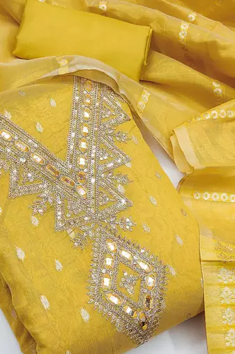 yellow  weaved shimmer butti unstitched dress material 