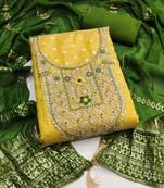 yellow  weaved shimmer butti unstitched dress material 