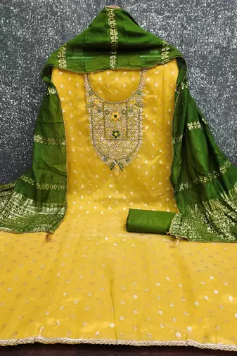 yellow  weaved shimmer butti unstitched dress material 
