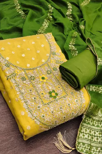 yellow  weaved shimmer butti unstitched dress material 