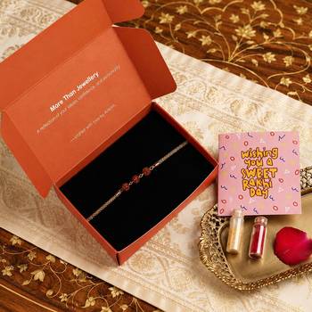 Divine rudraksha bead rakhi with gold-tone chain 1