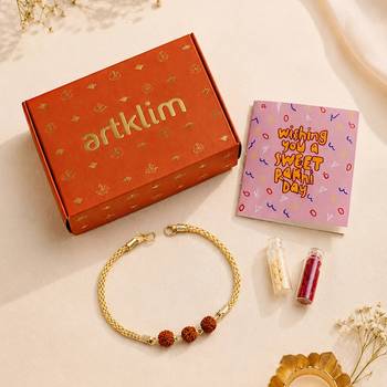 Divine rudraksha bead rakhi with gold-tone chain 2
