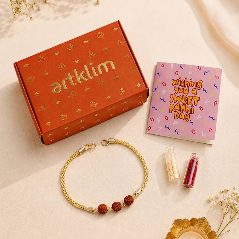 Divine rudraksha bead rakhi with gold-tone chain
