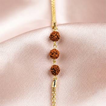 Divine rudraksha bead rakhi with gold-tone chain 3