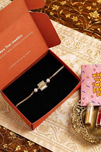 Designer bro rakhi with pearl beads