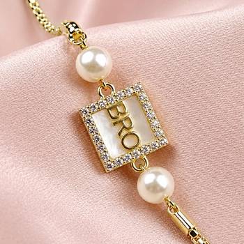 Designer bro rakhi with pearl beads 3