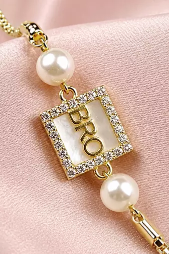 Designer bro rakhi with pearl beads