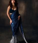 Navy blue heavy georgette sequins embroidered saree with cutwork lace border & silk blouse
