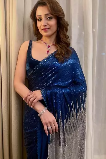 Navy blue heavy georgette sequins embroidered saree with cutwork lace border & silk blouse