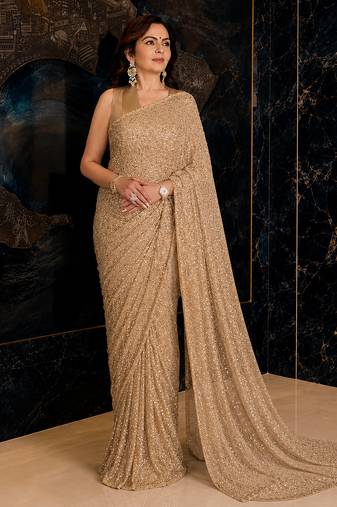 Champagne gold sequins embroidered party wear saree with matching blouse
