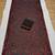 Black & red faux georgette floral sequins embroidered saree with mono silk blouse